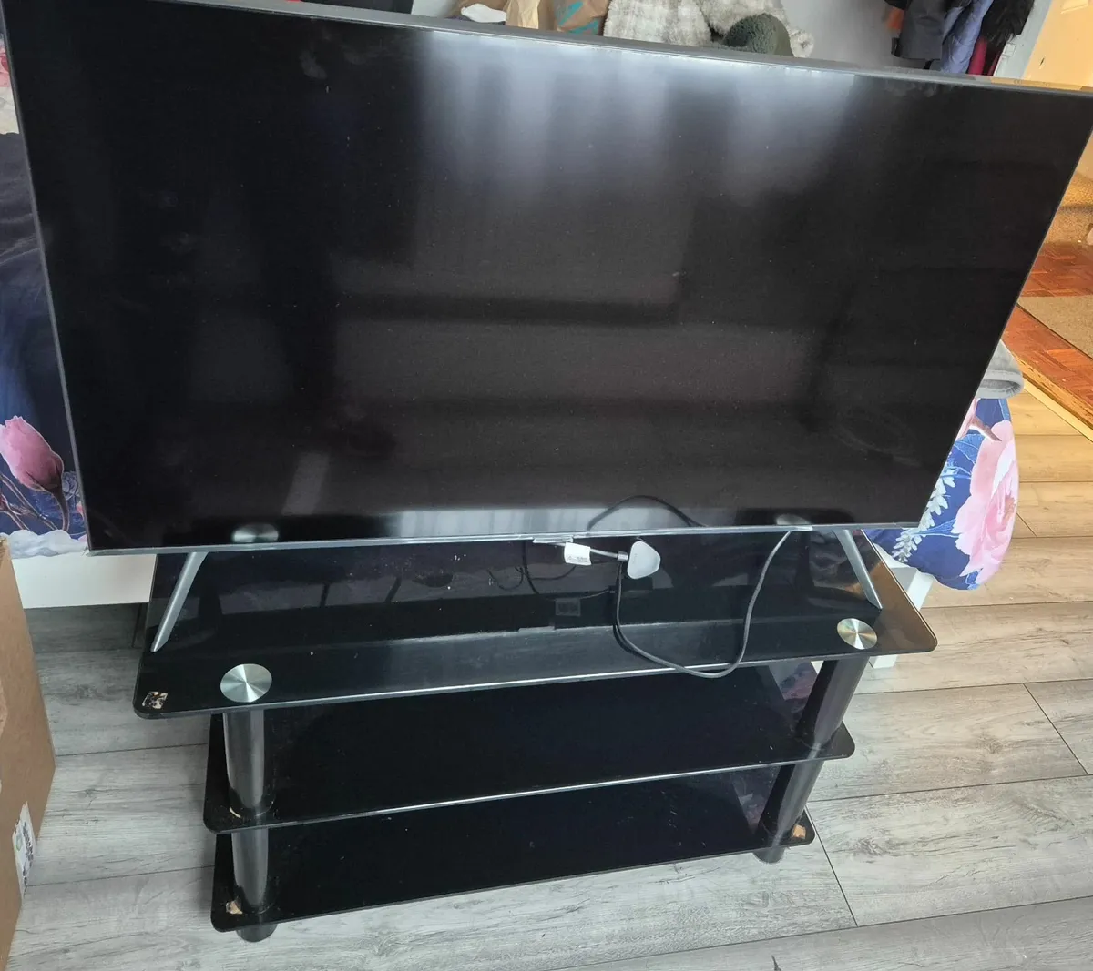 42 inch TV and TV Stand - Image 1