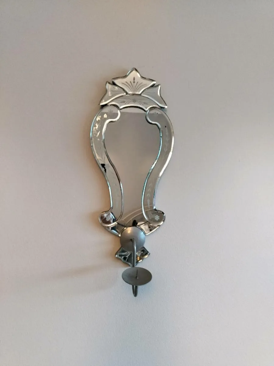 Mirror with candle holder
