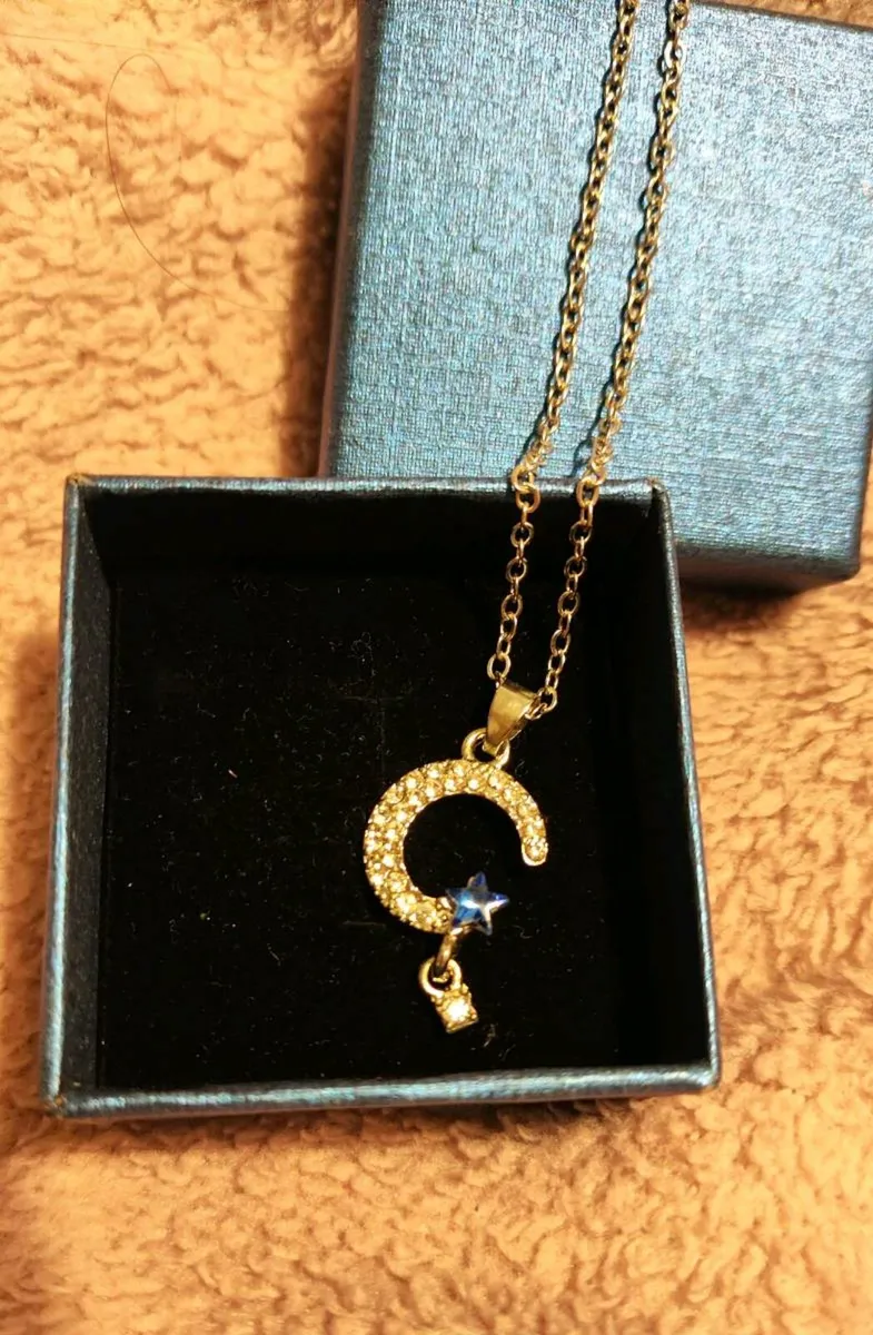 Celestial  Necklace – Moon, Star & Sparkle Cha - Image 1