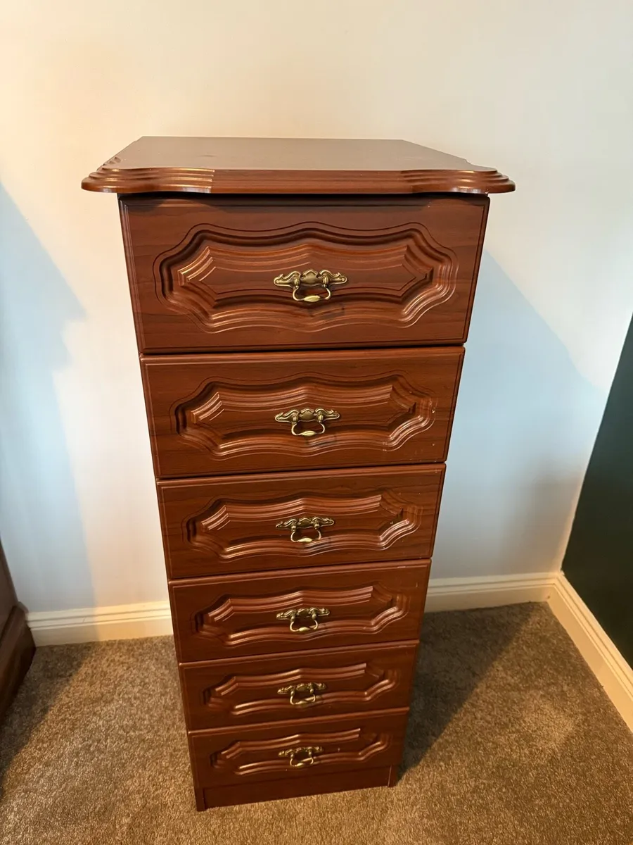 Tall boy chest of drawers