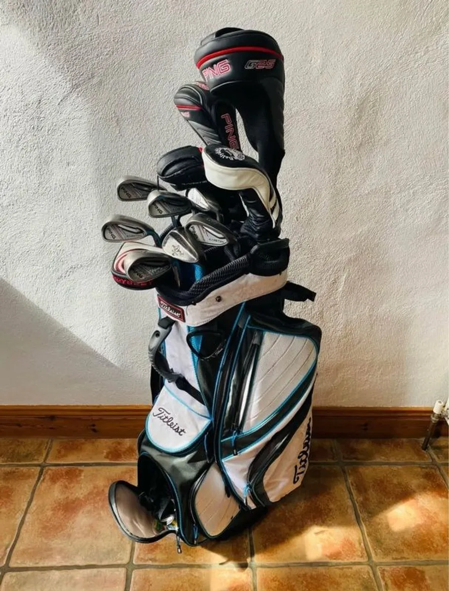 Set of golf clubs with trolley and watch - Image 1