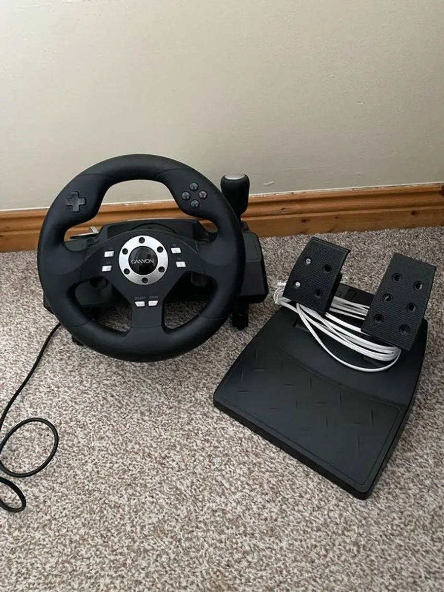 Steering wheel for PS3 And PS2 - Image 1