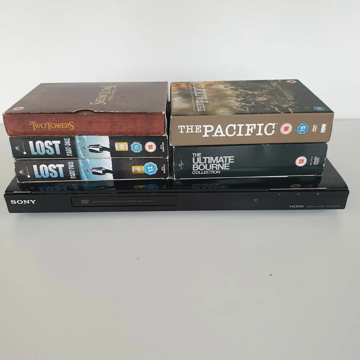 Sony DVD player with DVDs - Image 1