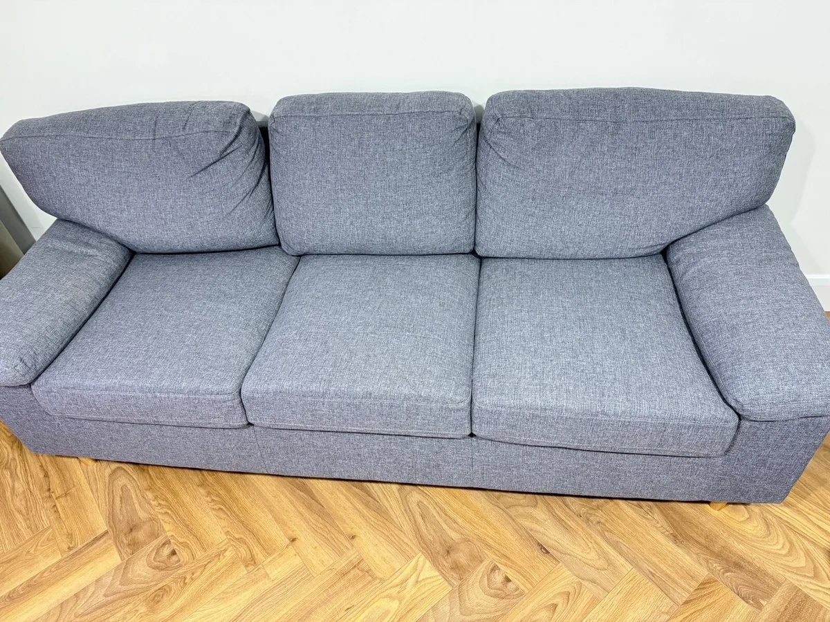 Grey sofa in near new condition - Image 1