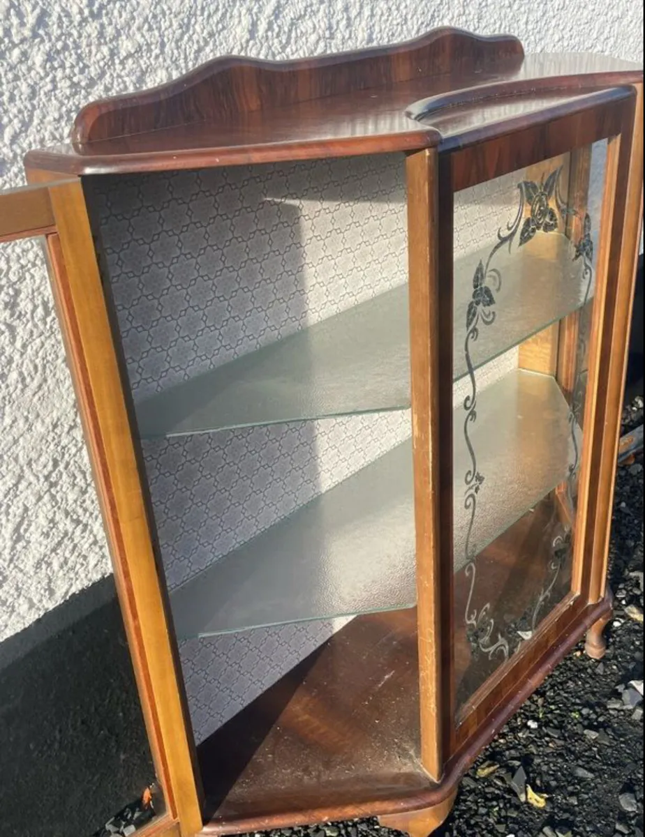 S.F Quinn antique glass cabinet