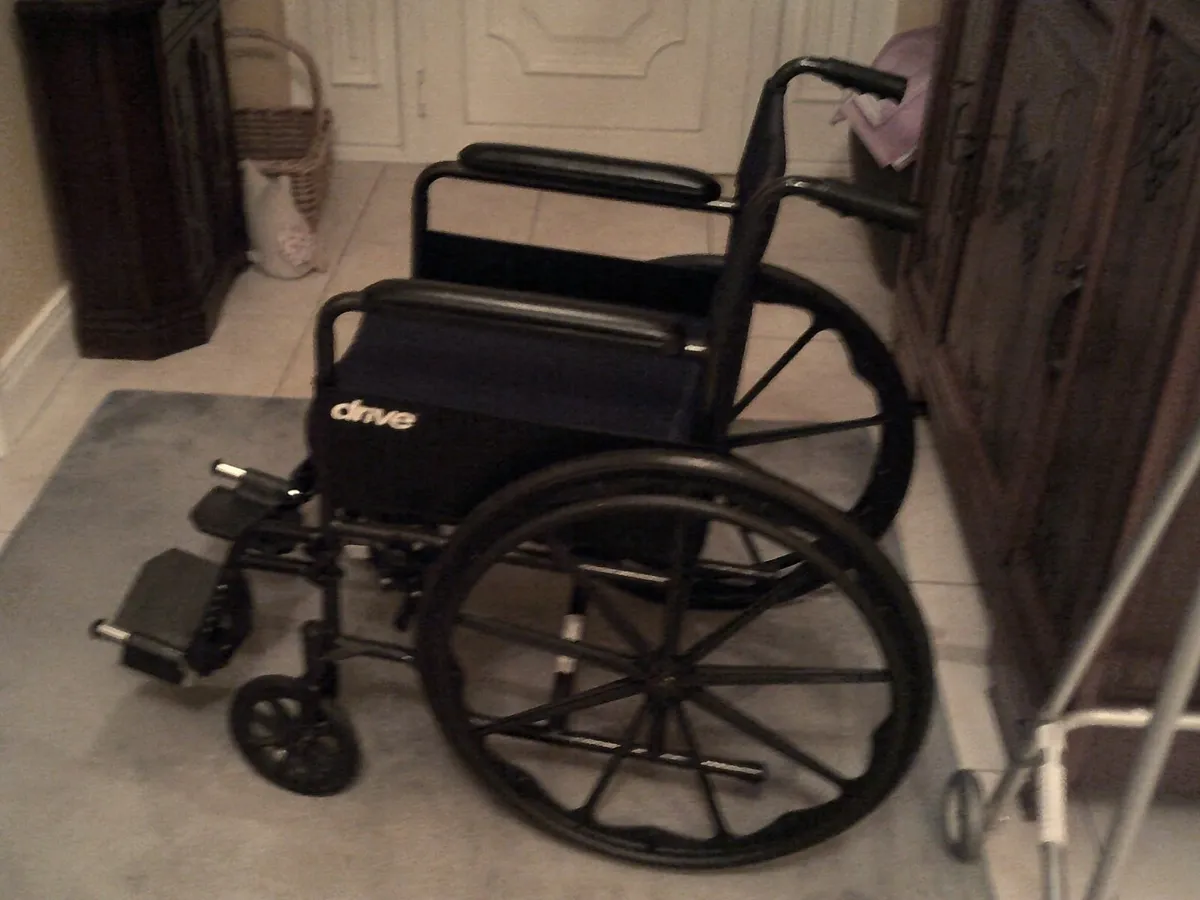 Self propelled wheelchair and walking frame - Image 1