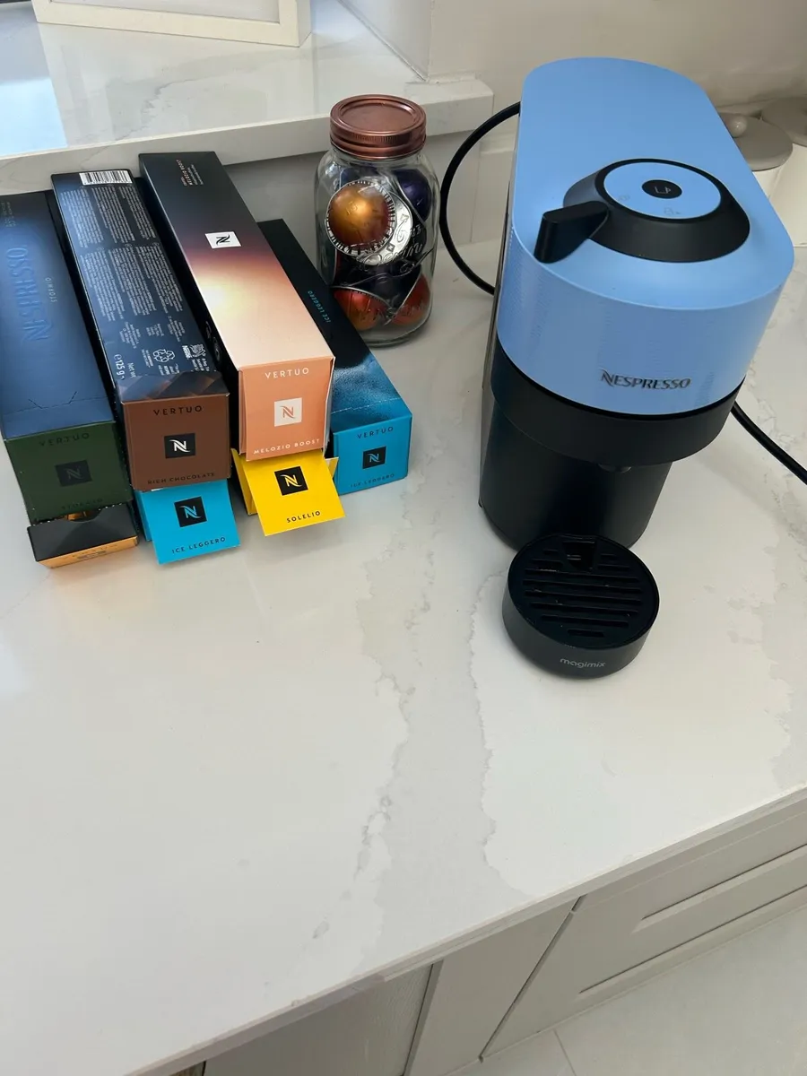 Nespresso coffee machine and pods - Image 1