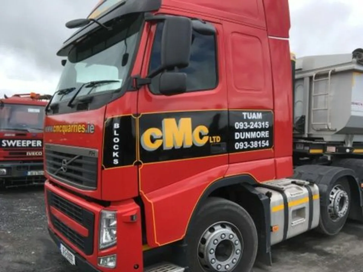 2012 Volvo FH13 - 2003 Hino Mixer - Image 1