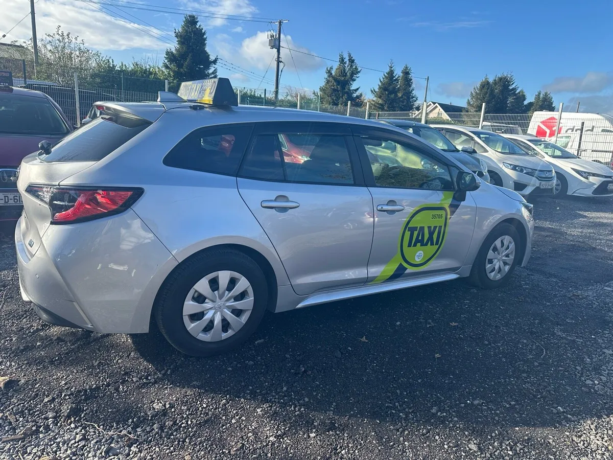 Toyota Corola Touring Hybrid Taxi for Rent