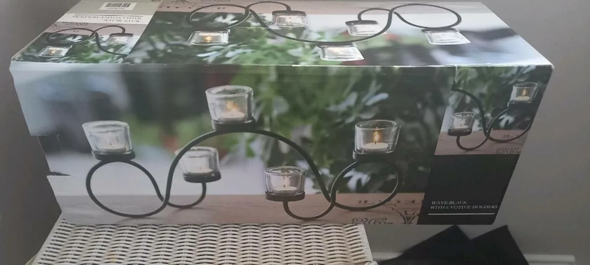 Wrought iron candle holder