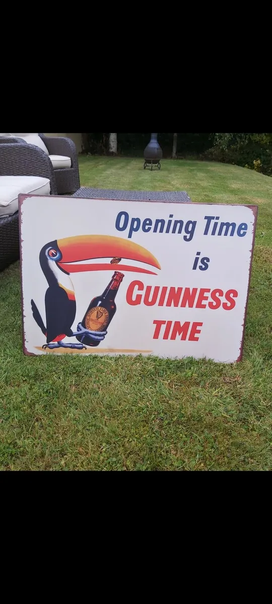 Guinness  opening times  metal sign