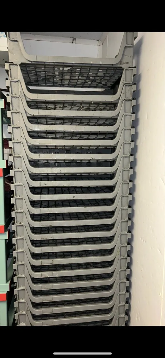 Stackable grey storage crates - Image 1