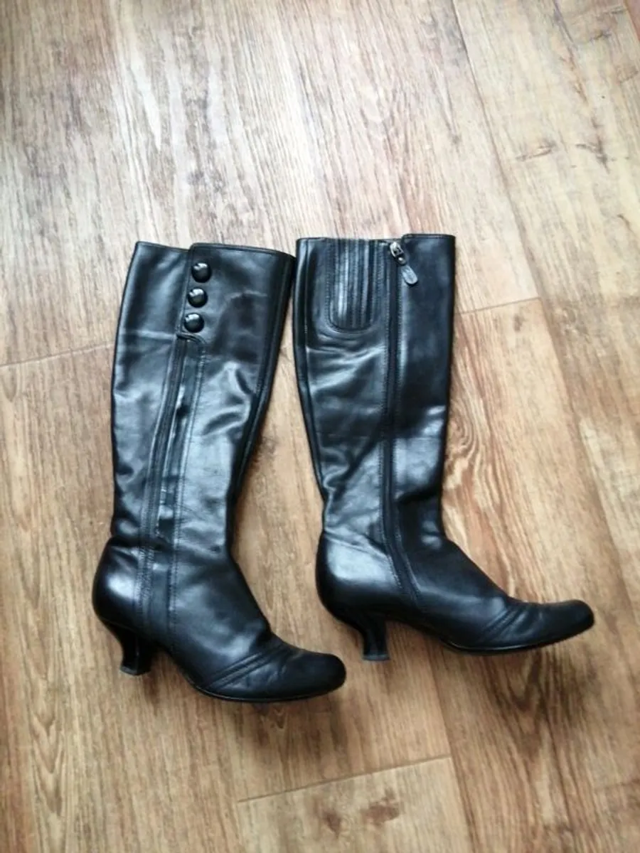 Clarks leather boots hardly worn. Low heel narrow fit  very comfortable.