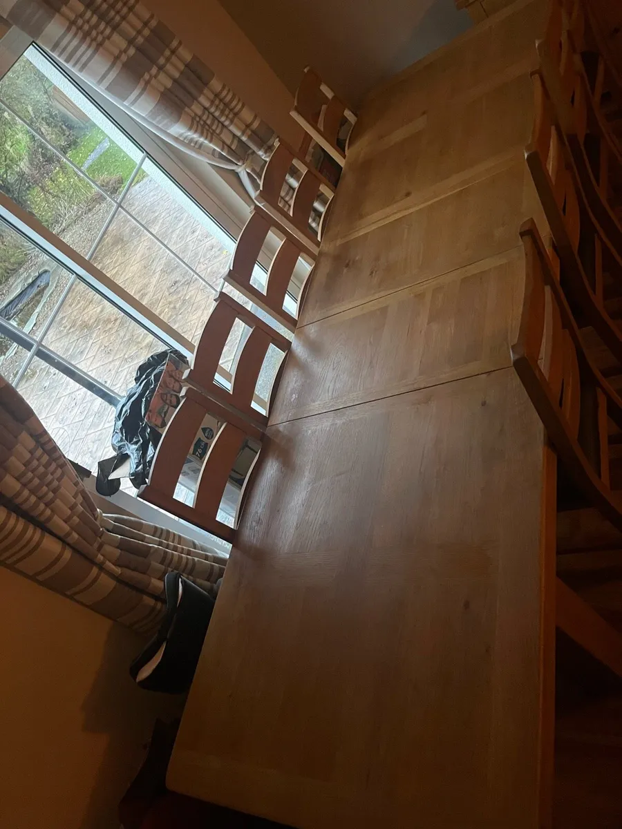 Solid oak dining table, 10 chairs and sideboard - Image 4