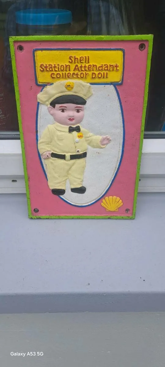 Shell cast iron sign