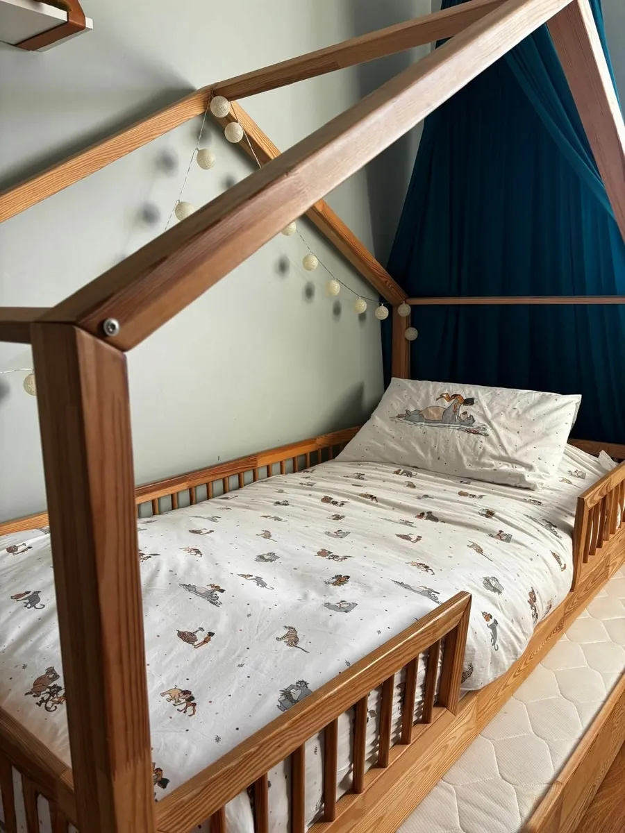 Childrens solid wood bed with trundle - Image 1