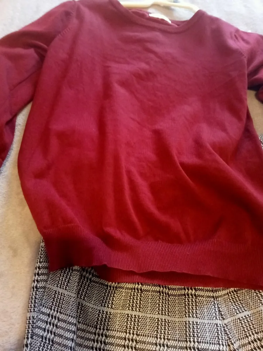 Trousers  and red jumper with white frill top unde - Image 1