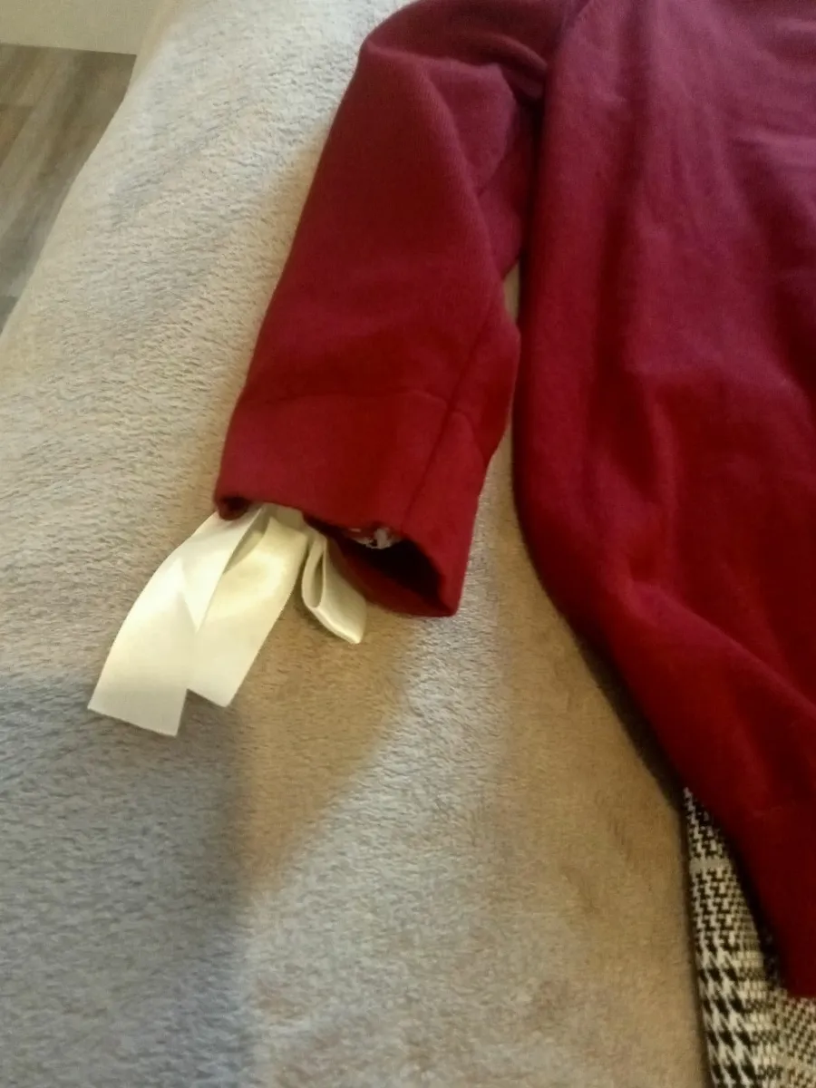 Trousers  and red jumper with white frill top unde - Image 2
