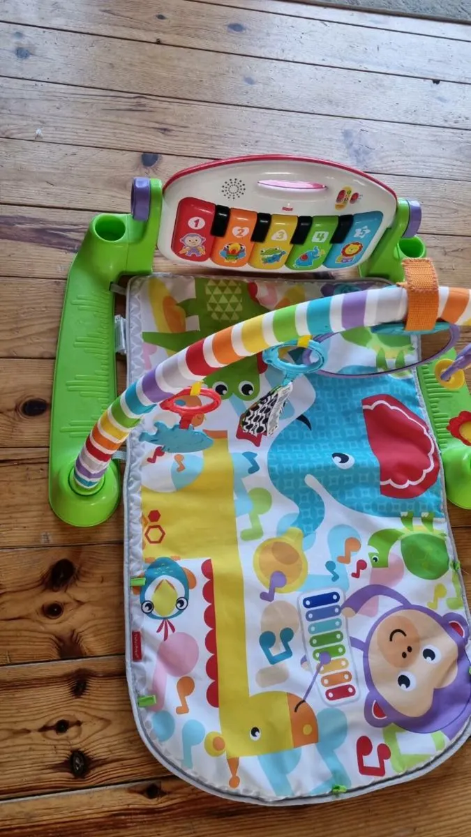 Baby play gym and piano