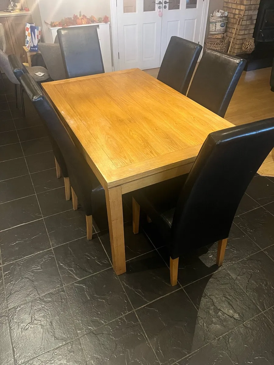 Kitchen Table and 6 black leather chairs - Image 1
