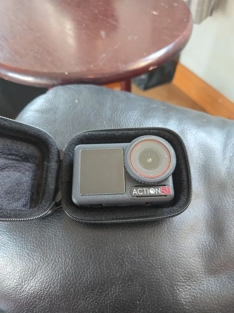 dji osmo action 5 pro with case and extras - Image 1
