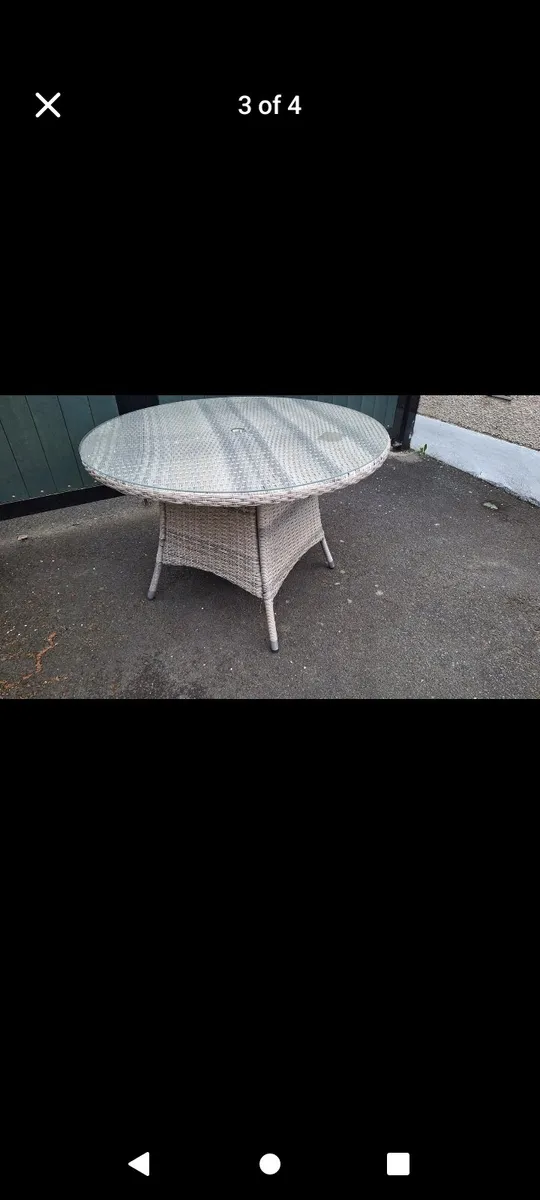 Garden table with glass top