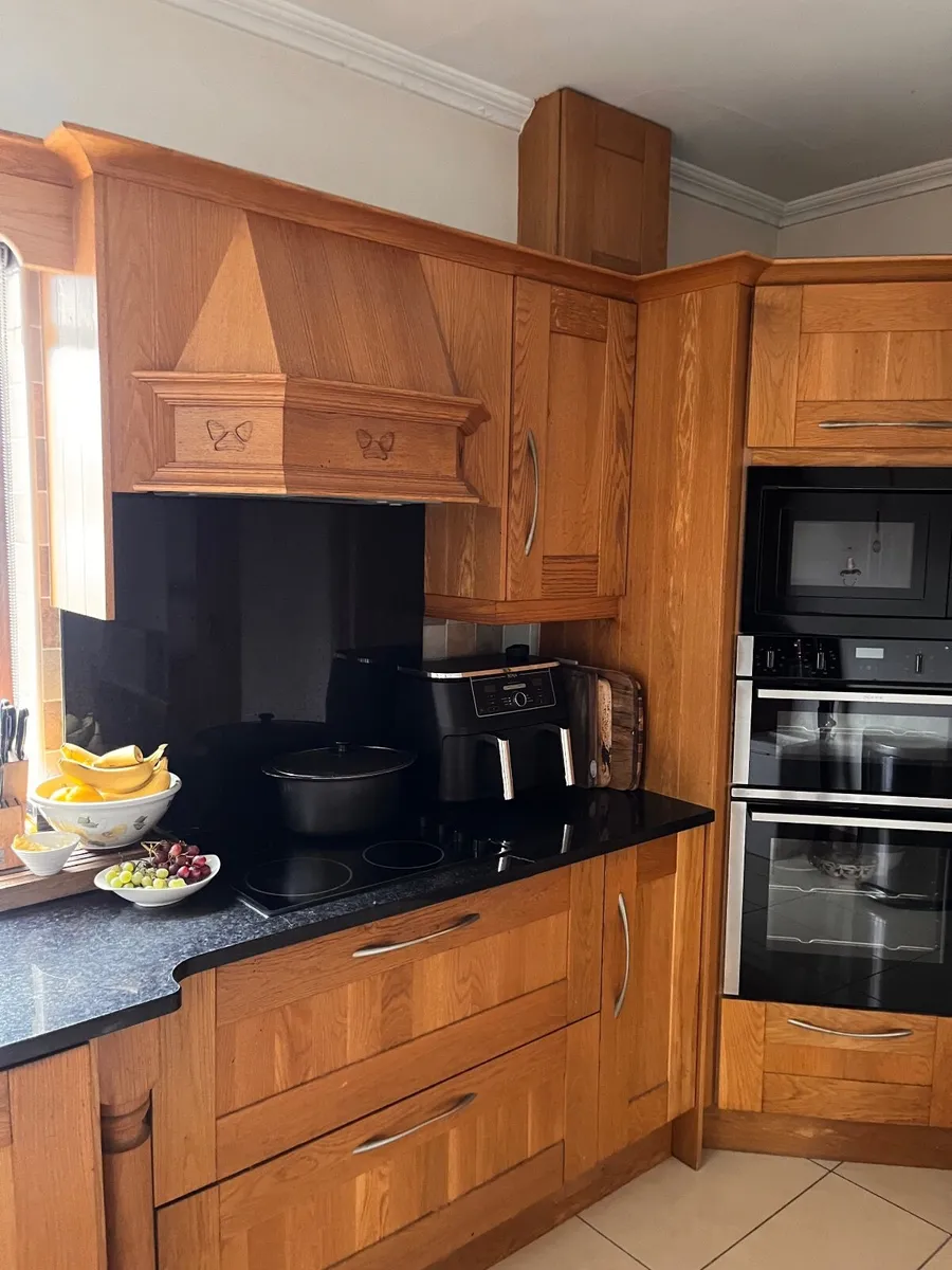 Solid oak kitchen cabinets and granite backsplash - Image 4