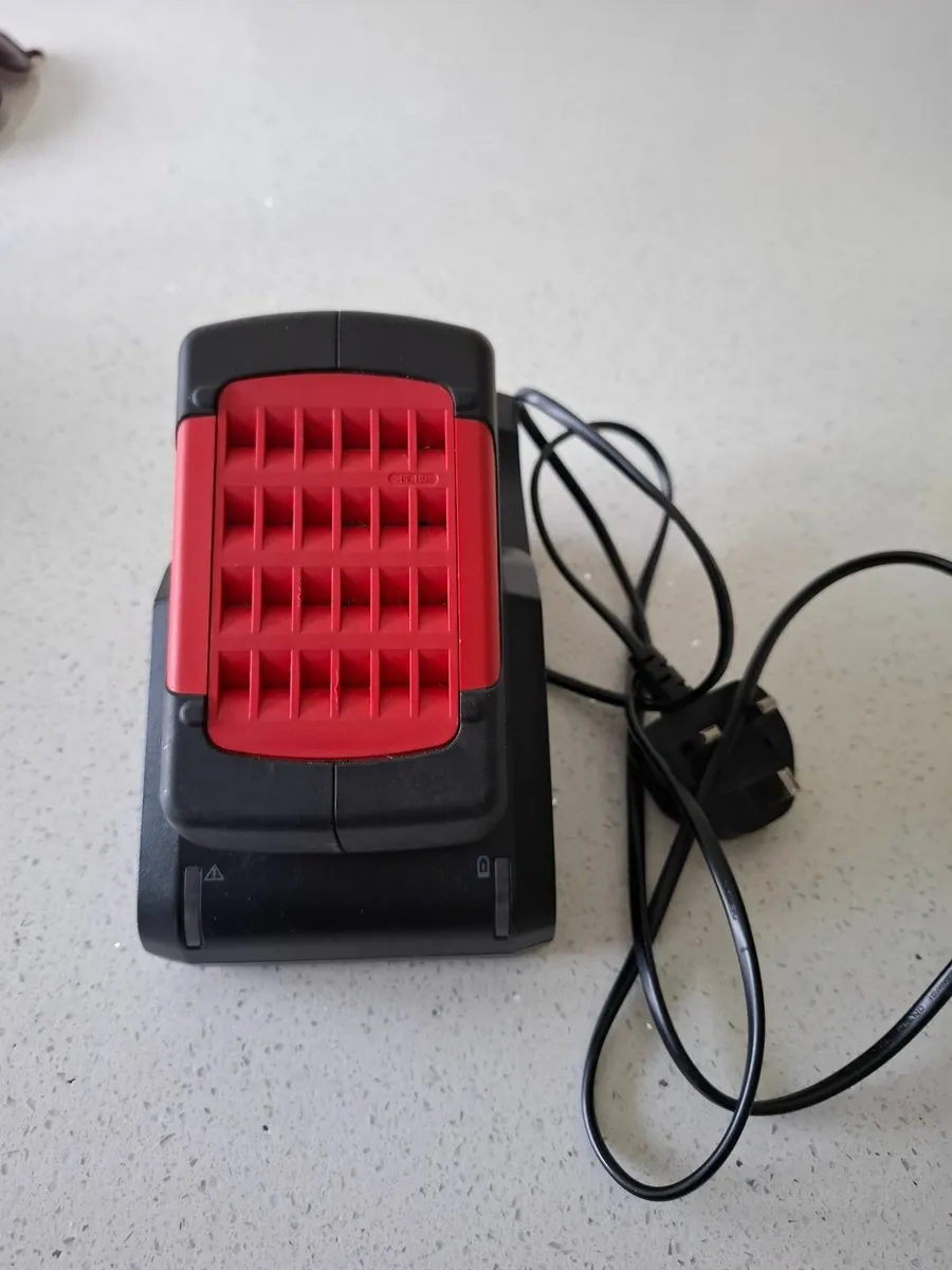 Battery and charger - Image 1