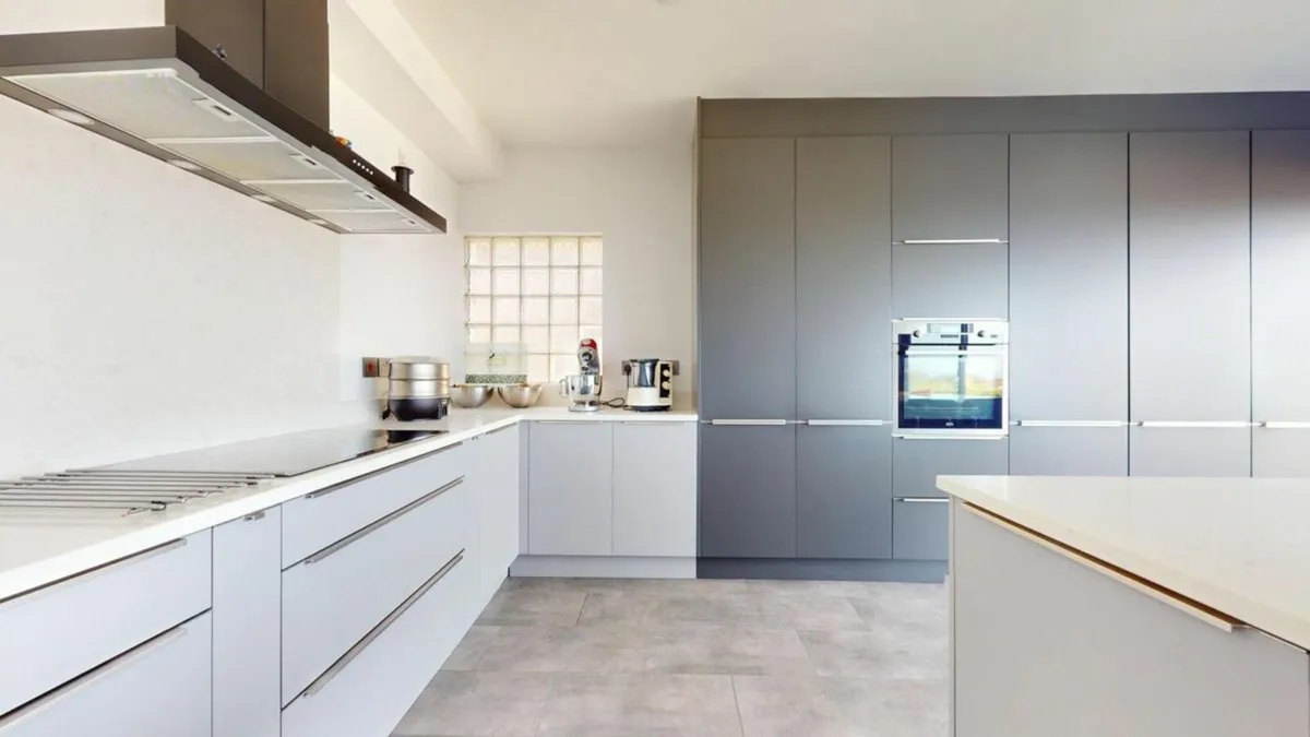 Contemporary Kitchen with Integrated Dining Area - Image 3