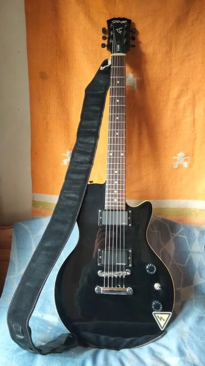 Stagg L250 modified + Padded gig bag + Leather strap - Image 1