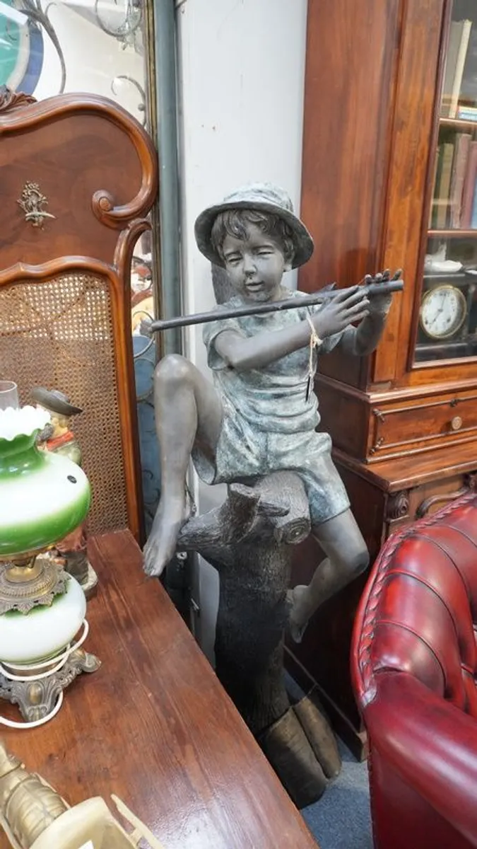 Stunning Bronze Sculpture of a Boy Playing Flute - Image 1