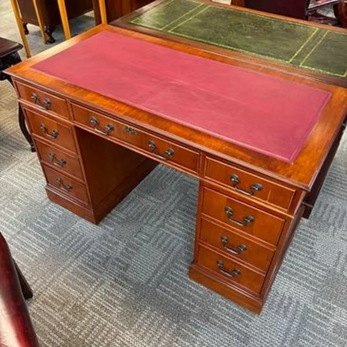 Mahogany flamed red leather top twin pedestal writ