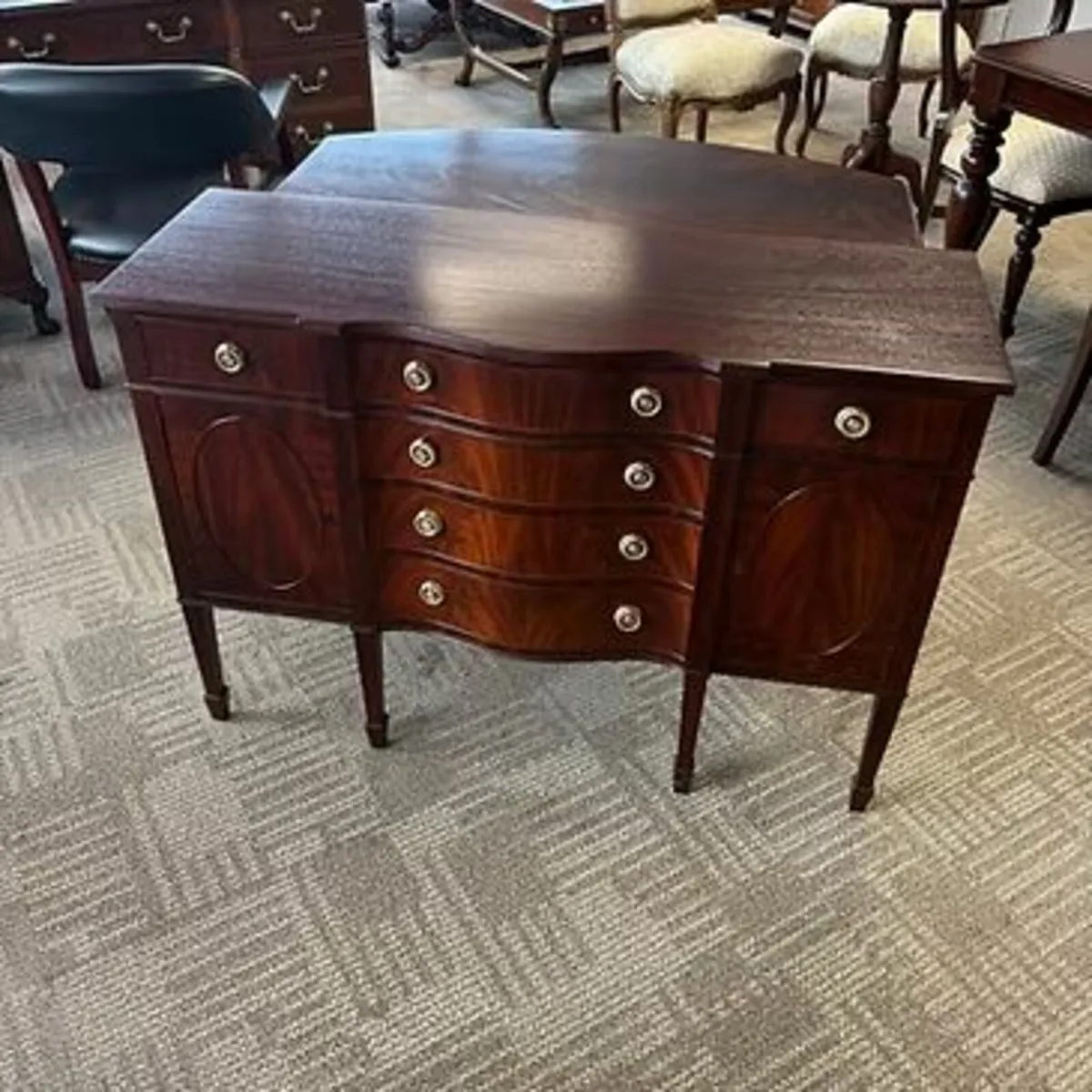 Mahogany bow fronted serpentine sideboar