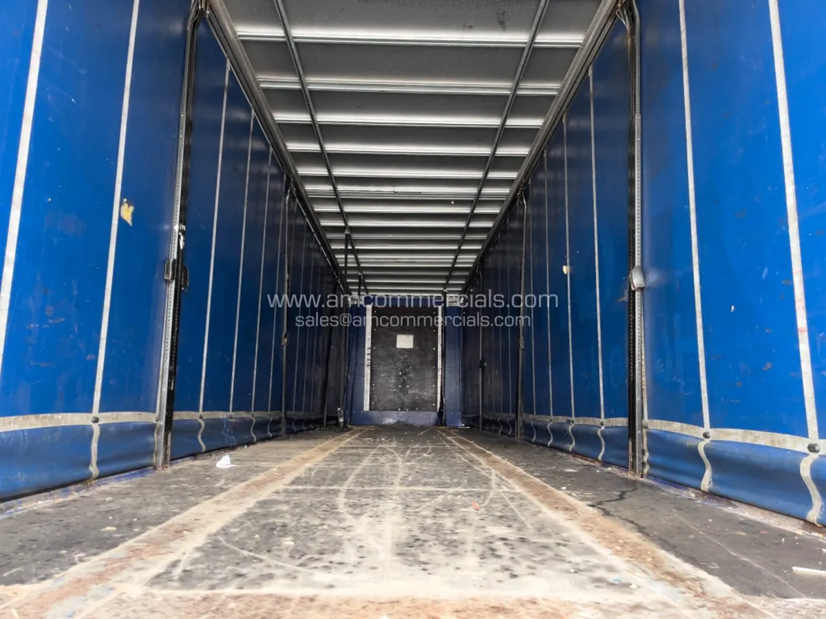 2014 SDC 4290MM TRI AXLE CURTAINSIDE TRAILER - Image 1