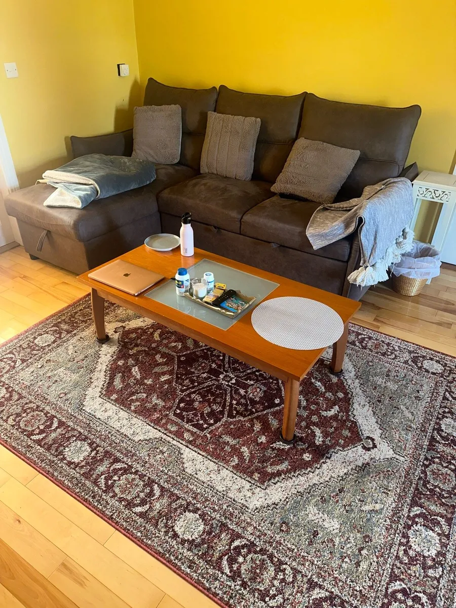 L-shaped Sofa Bed with Carpet - Image 1