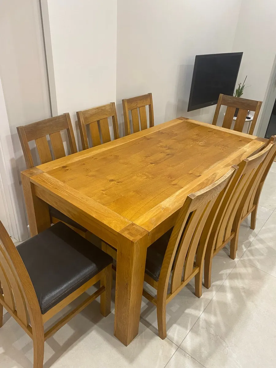 Dining Table and 8 chairs - Image 1