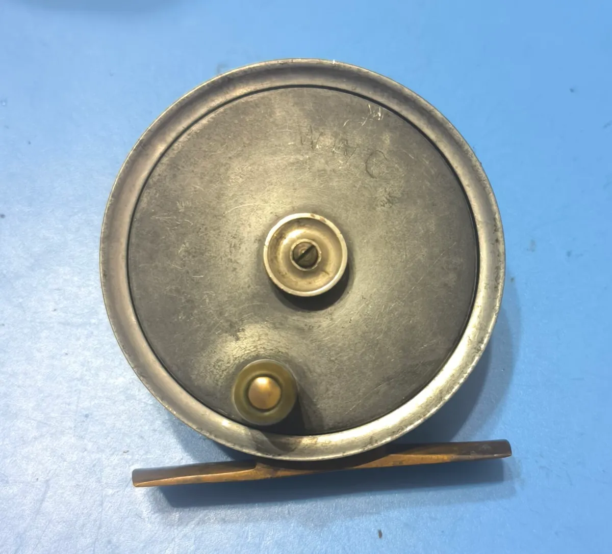 Vintage centre brake fly reel 2 3/4" dia, old fish - Image 1