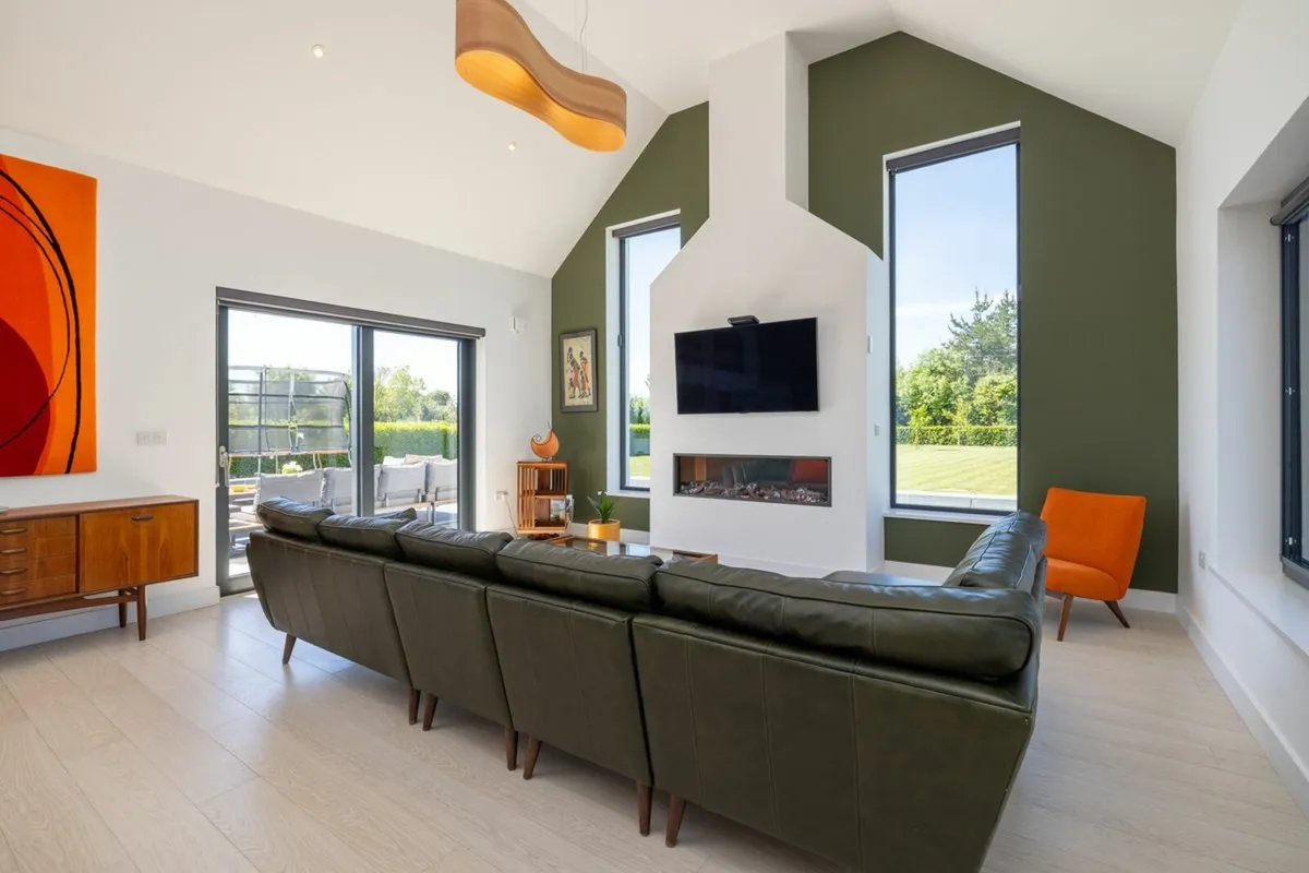 Green leather L shaped sofa - Image 3