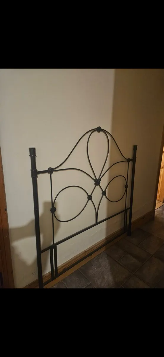 Black metal head board