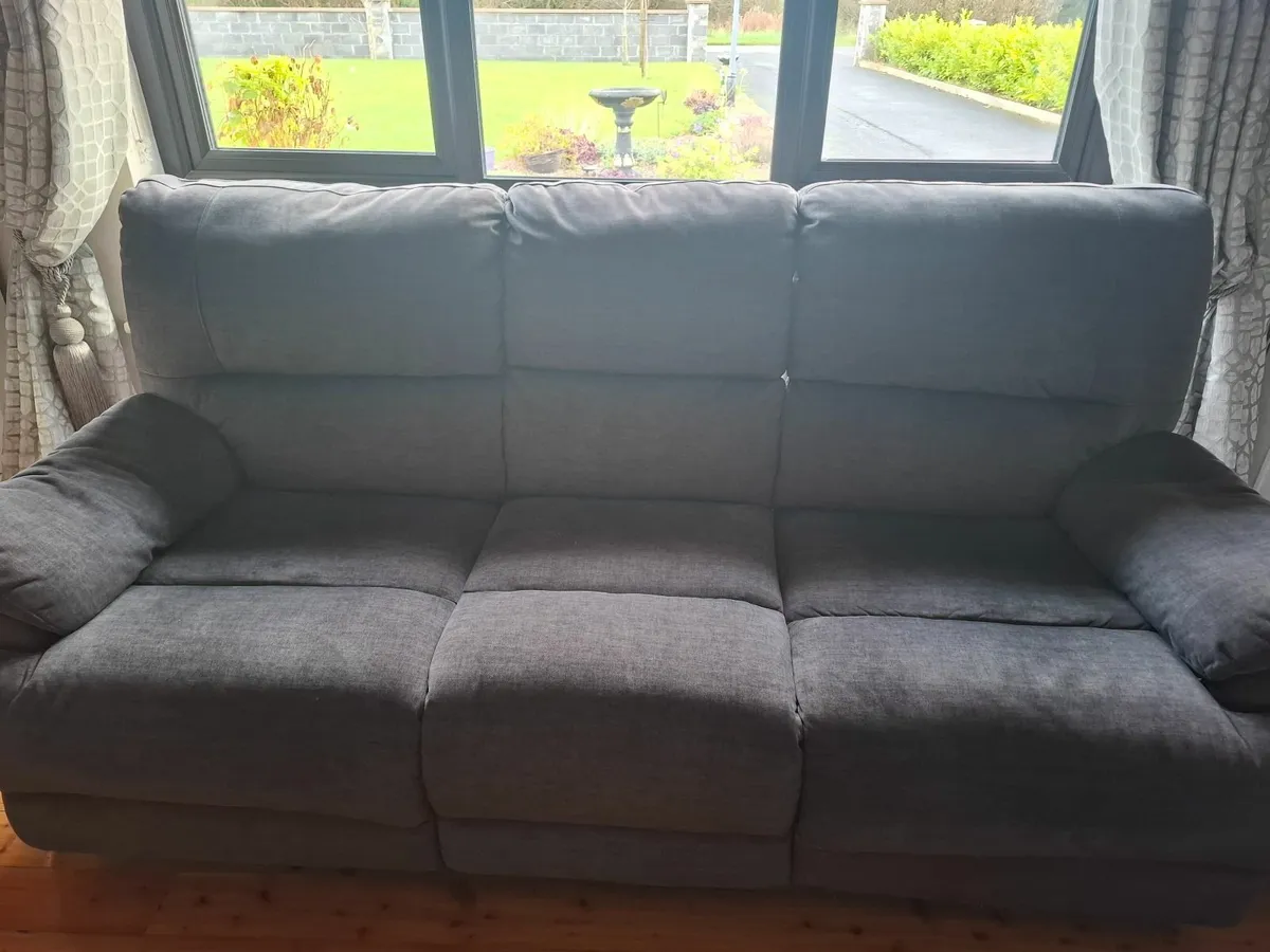 GREY RECLINER COUCH. - Image 1