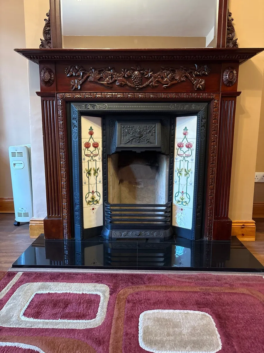 Antique fireplace and a Brass and Iron bed - Image 1