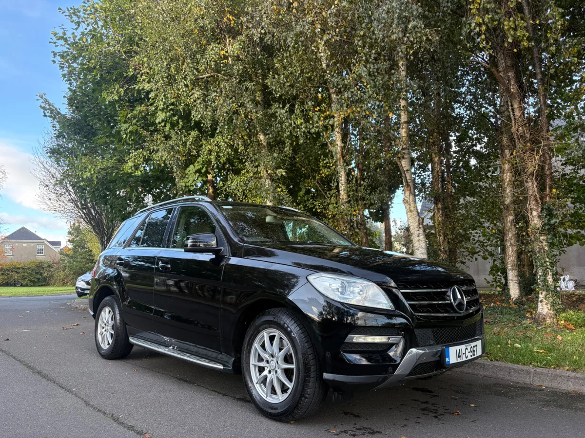 2014 Mercedes-Benz ML 250 doe and tax - Image 1