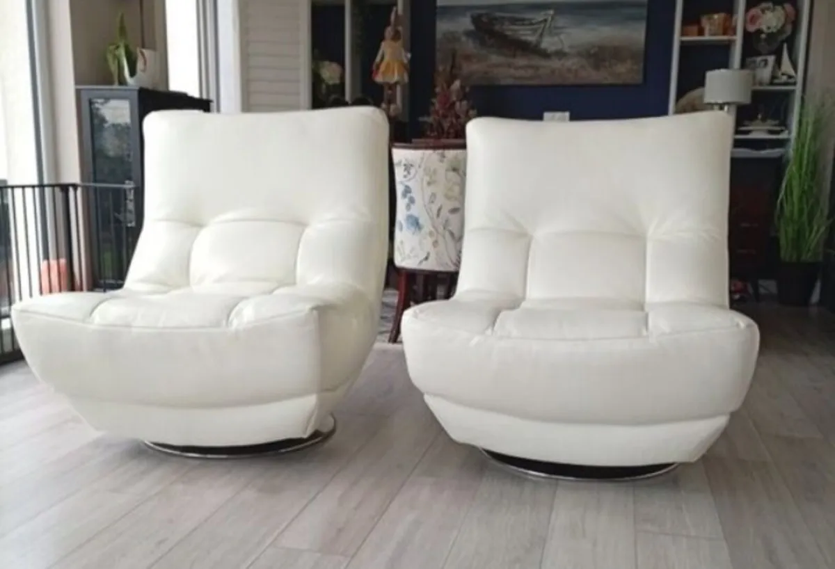 White leather armchairs
