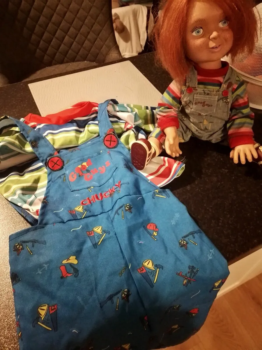 Halloween costume kids and Chucky good guy doll
