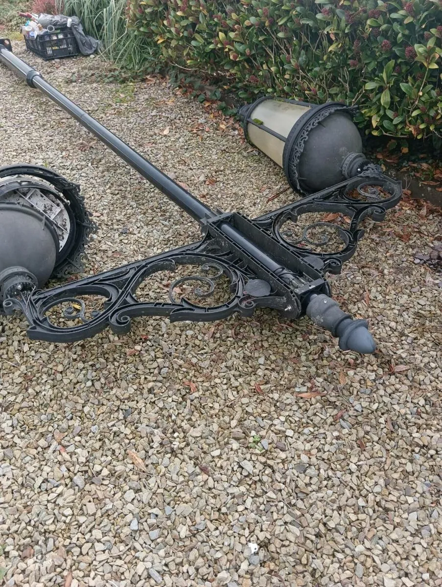 Vintage outdoor lights on steel poles - Image 2