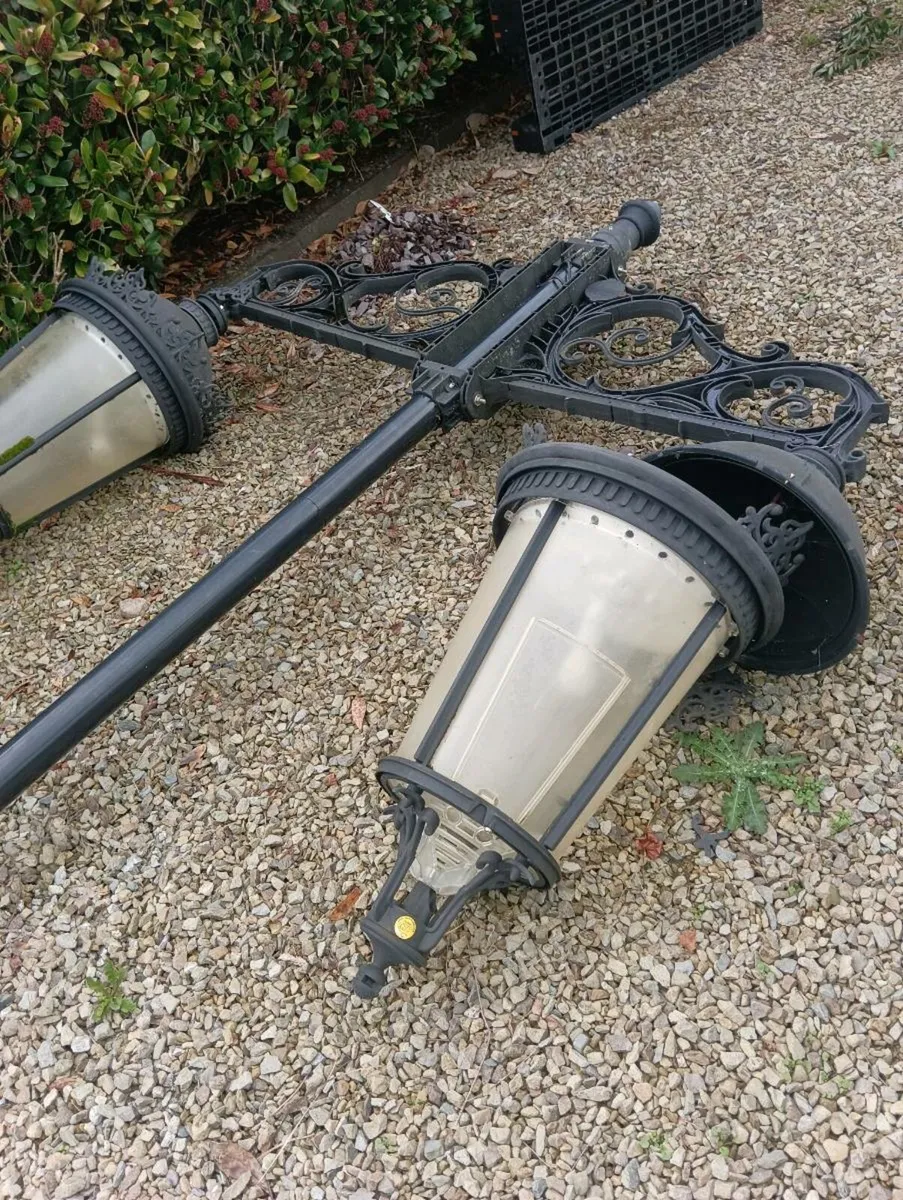 Vintage outdoor lights on steel poles - Image 3