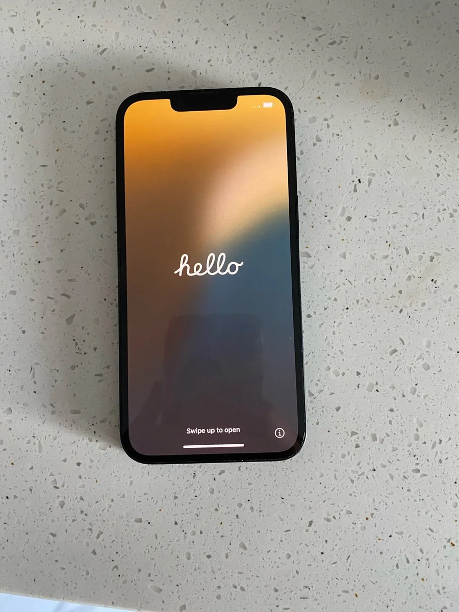 Iphone 14 with leather phone case - Image 1