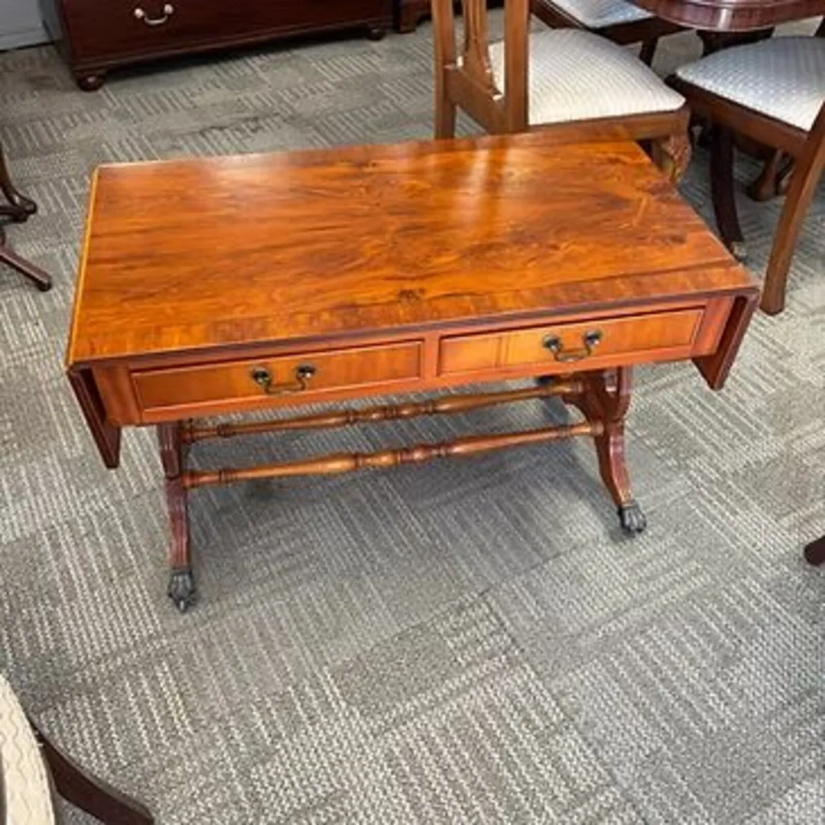 Beautiful mahogany drop leaf coffee table. Swipe f