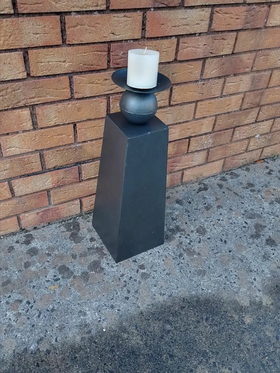 LARGE METAL PYRAMID STYLE CANDLE HOLDER.