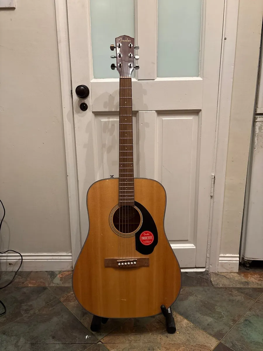 Fender guitar and guitar stand